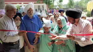 All India Charitable Society president Bibi Inderjit Kaur inaugurating the school at Kakkon village in Hoshiarpur.(HT Photo)