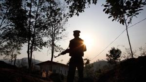 In this March 20, 2018 photo, a Kachin Independence army rebel stands at frontline outpost facing no man's land in Lawa Yang, outside of Laiza, the armed group's headquarters in northern Kachin state, Myanmar.(APo) In this March 20, 2018 photo, a Kachin Independence army rebel stands at frontline outpost facing no man's land in Lawa Yang, outside of Laiza, the armed group's headquarters in northern Kachin state, Myanmar.(APo)