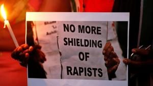 People participate in a candle light vigil as they protest against the rape of an eight-year-old girl in Kathua near Jammu, and a teenager in Unnao, in Ahmedabad, April13, 2018.(Reuters File Photo) People participate in a candle light vigil as they protest against the rape of an eight-year-old girl in Kathua near Jammu, and a teenager in Unnao, in Ahmedabad, April13, 2018.(Reuters File Photo)