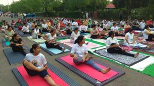 Yogis doing stretches at the Raahgiri event in front of the Yavanika Town Park in Panchkula on Sunday morning. Raahgiri is an initiative to motivate passers-by to adopt a healthy lifestyle.(HT Photo) Yogis doing stretches at the Raahgiri event in front of the Yavanika Town Park in Panchkula on Sunday morning. Raahgiri is an initiative to motivate passers-by to adopt a healthy lifestyle.(HT Photo)