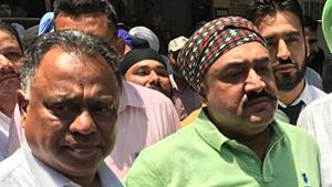 Inspector Parminder Singh Bajwa in police custody at the court complex in Jalandhar on Friday.(HT Photo) Inspector Parminder Singh Bajwa in police custody at the court complex in Jalandhar on Friday.(HT Photo)