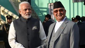 Nepali Prime Minister KP Sharma Oli greets Indian Prime Minister Narendra Modi during a guard of honour in Kathmandu on May 11.(AFP Photo) Nepali Prime Minister KP Sharma Oli greets Indian Prime Minister Narendra Modi during a guard of honour in Kathmandu on May 11.(AFP Photo)