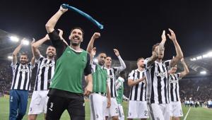 Juventus won a seventh straight Serie A title on Sunday after a goalless draw against ten-man Roma at the Stadio Olimpico. The Turin giants become the first team to complete the league and Cup double for four consecutive seasons. It is the 34th Scudetto in Juventus's history.(AFP) Juventus won a seventh straight Serie A title on Sunday after a goalless draw against ten-man Roma at the Stadio Olimpico. The Turin giants become the first team to complete the league and Cup double for four consecutive seasons. It is the 34th Scudetto in Juventus's history.(AFP)