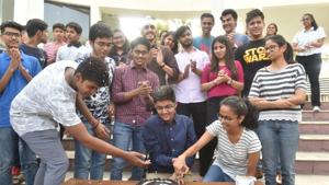 Toppers cutting cake after the announcement of ICSE and ISC results at the Sanskar valley school in Bhopal on Monday.(Mujeeb Faruqui/HT Photo) Toppers cutting cake after the announcement of ICSE and ISC results at the Sanskar valley school in Bhopal on Monday.(Mujeeb Faruqui/HT Photo)