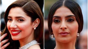 Sonam Kapoor and Mahira Khan greeted each other before walking on the red carpet at Cannes on Monday.(Reuters) Sonam Kapoor and Mahira Khan greeted each other before walking on the red carpet at Cannes on Monday.(Reuters)