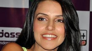 Neha Dhupia’s gown was somewhere between a marigold and the shade of mustard — sounds appealing, no? (IANS File Photo) Neha Dhupia’s gown was somewhere between a marigold and the shade of mustard — sounds appealing, no? (IANS File Photo)