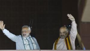 Prime Minister Narendra Modi and Bharatiya Janata Party chief Amit Shah at the BJP headquarters in New Delhi on Tuesday.(HT Photo) Prime Minister Narendra Modi and Bharatiya Janata Party chief Amit Shah at the BJP headquarters in New Delhi on Tuesday.(HT Photo)