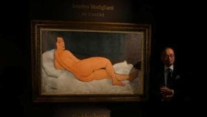 Kevin Ching, CEO of Sotheby's Asia, stands next to Amedeo Modigliani's ‘Nu couche’, expected to fetch over $150 million (USD) in the New York auction in May, during a preview in Hong Kong, China.(REUTERS/Venus Wu) Kevin Ching, CEO of Sotheby's Asia, stands next to Amedeo Modigliani's ‘Nu couche’, expected to fetch over $150 million (USD) in the New York auction in May, during a preview in Hong Kong, China.(REUTERS/Venus Wu)
