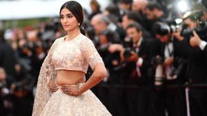 Indian actor Sonam Kapoor poses as she arrives on May 14, 2018 for the screening of the film BlacKkKlansman at the 71st edition of the Cannes Film Festival in Cannes.(AFP) Indian actor Sonam Kapoor poses as she arrives on May 14, 2018 for the screening of the film BlacKkKlansman at the 71st edition of the Cannes Film Festival in Cannes.(AFP)