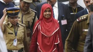 Twenty four-year-old Hadiya (centre) at the Supreme Court in November 2017. A Muslim man approached the apex court saying the case of abduction filed against him by his wife’s Hindu parents was incorrect, and sought his spouse’s release.(Vipin Kumar/HT Photo) Twenty four-year-old Hadiya (centre) at the Supreme Court in November 2017. A Muslim man approached the apex court saying the case of abduction filed against him by his wife’s Hindu parents was incorrect, and sought his spouse’s release.(Vipin Kumar/HT Photo)