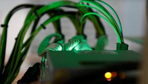 Cables running into cryptocurrency miners are seen at the HydroMiner cryptocurrency farming operation in Austria April 25, 2018.(Reuters File Photo) Cables running into cryptocurrency miners are seen at the HydroMiner cryptocurrency farming operation in Austria April 25, 2018.(Reuters File Photo)