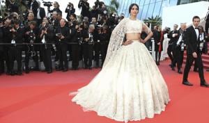 Actor Sonam Kapoor ditched predictable gowns and pants suits, instead opting to surprise everyone with a dreamy ivory lehenga by Australian couturiers, Ralph & Russo.(AP) Actor Sonam Kapoor ditched predictable gowns and pants suits, instead opting to surprise everyone with a dreamy ivory lehenga by Australian couturiers, Ralph & Russo.(AP)