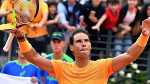Rafael Nadal celebrates after winning his match against Bosnia's Damir Dzumhur at the Italian Open tennis tournament in Rome.(AP) Rafael Nadal celebrates after winning his match against Bosnia's Damir Dzumhur at the Italian Open tennis tournament in Rome.(AP)