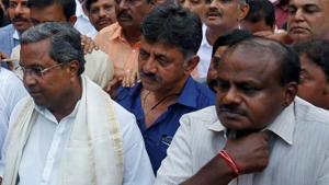 Former Karnataka chief minister Siddaramaiah (L) and Janata Dal (Secular) leader HD Kumaraswamy (R) waiting outside the governor's house, Bengaluru, May 15, 2018(REUTERS) Former Karnataka chief minister Siddaramaiah (L) and Janata Dal (Secular) leader HD Kumaraswamy (R) waiting outside the governor's house, Bengaluru, May 15, 2018(REUTERS)