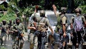 Army soldiers in action outside a house where militants were hiding during an encounter.(PTI File Photo) Army soldiers in action outside a house where militants were hiding during an encounter.(PTI File Photo)