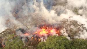Lava spattering from an area between active fissures of the Kilauea volcano, near Pahoa, Hawaii.(AP File Photo) Lava spattering from an area between active fissures of the Kilauea volcano, near Pahoa, Hawaii.(AP File Photo)