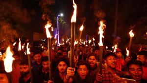 Activists of All Assam Students' Union take part in a torch light procession in protest against the Citizenship (Amendment) Bill 2016 proposal in Guwahati on May 14.(AFP File Photo) Activists of All Assam Students' Union take part in a torch light procession in protest against the Citizenship (Amendment) Bill 2016 proposal in Guwahati on May 14.(AFP File Photo)