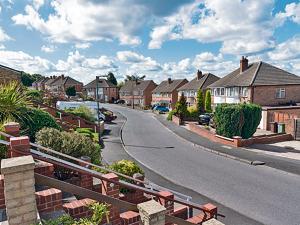 Of passion in English suburbia: A street in a suburb of Birmingham, UK.(UIG via Getty Images) Of passion in English suburbia: A street in a suburb of Birmingham, UK.(UIG via Getty Images)