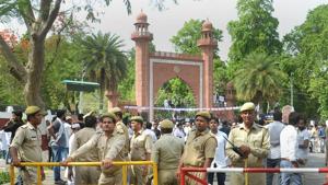 Security personnel outside the Aligarh Muslim University campus after students staged a protest over the Jinnah portrait issue, May 4(PTI) Security personnel outside the Aligarh Muslim University campus after students staged a protest over the Jinnah portrait issue, May 4(PTI)