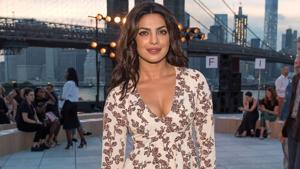 At the royal wedding, Priyanka Chopra will have to wear a very specific outfit consisting of a modest day dress and a hat. (AP File Photo) At the royal wedding, Priyanka Chopra will have to wear a very specific outfit consisting of a modest day dress and a hat. (AP File Photo)