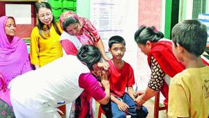 Nassir Hussain, 12, gets vaccinated against measles and rubella on May 12 at a primary health centre in Kwakta, Bishnupur district. The vaccination drive had to be extended in Manipur because of high refusals among Muslims following fake news.(Sanchita Sharma/HT Photo) Nassir Hussain, 12, gets vaccinated against measles and rubella on May 12 at a primary health centre in Kwakta, Bishnupur district. The vaccination drive had to be extended in Manipur because of high refusals among Muslims following fake news.(Sanchita Sharma/HT Photo)
