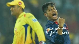 Delhi Daredevils bowler Sandeep Lamichhane celebrates after taking the wicket of Chennai Super Kings’ Suresh Raina as MS Dhoni looks on during their Indian Premier League (IPL 2018) match on Friday.(PTI)