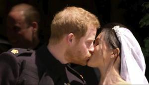 In this frame from video, Britain's Prince Harry and Meghan Markle kiss after their wedding ceremony at St. George's Chapel in Windsor Castle in Windsor, near London, England, Saturday, May 19, 2018.(AP) In this frame from video, Britain's Prince Harry and Meghan Markle kiss after their wedding ceremony at St. George's Chapel in Windsor Castle in Windsor, near London, England, Saturday, May 19, 2018.(AP)