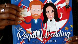 A Harry and Meghan cut out book is among the numerous merchandise that has hit stores ahead of the British royal wedding.(Reuters) A Harry and Meghan cut out book is among the numerous merchandise that has hit stores ahead of the British royal wedding.(Reuters)