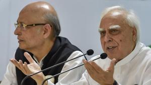 Senior Congress leaders Abhishek Manu Singhvi and Kapil Sibal during a press conference, in New Delhi, on Saturday.(PTI) Senior Congress leaders Abhishek Manu Singhvi and Kapil Sibal during a press conference, in New Delhi, on Saturday.(PTI)