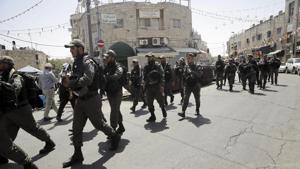 Israeli border police deploy in east Jerusalem during the first Friday of the holy month of Ramadan, in Jerusalem, on May 18.(AP) Israeli border police deploy in east Jerusalem during the first Friday of the holy month of Ramadan, in Jerusalem, on May 18.(AP)