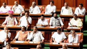 Karnataka chief minister B S Yediyurappa(bottom right) with his party members during the oath taking ceremony of the newly-elected members of the house at Vidhana Soudha, in Bengaluru, on Saturday.(PTI) Karnataka chief minister B S Yediyurappa(bottom right) with his party members during the oath taking ceremony of the newly-elected members of the house at Vidhana Soudha, in Bengaluru, on Saturday.(PTI)