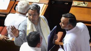 Former Chief Minister Siddaramaiah with party MLA's during the oath taking ceremony of the newly elected members of the house, at Vidhana Soudha, in Bengaluru, on Saturday.(PTI Photo) Former Chief Minister Siddaramaiah with party MLA's during the oath taking ceremony of the newly elected members of the house, at Vidhana Soudha, in Bengaluru, on Saturday.(PTI Photo)