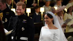 Prince Harry and Meghan Markle in St George's Chapel at Windsor Castle during their wedding in Windsor, Britain.(REUTERS) Prince Harry and Meghan Markle in St George's Chapel at Windsor Castle during their wedding in Windsor, Britain.(REUTERS)