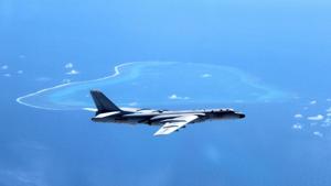 In this undated file photo released by Xinhua News Agency, a Chinese H-6K bomber patrols the islands and reefs in the South China Sea.(AP FILE) In this undated file photo released by Xinhua News Agency, a Chinese H-6K bomber patrols the islands and reefs in the South China Sea.(AP FILE)