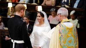 Prince Harry and Meghan Markle in St. George's Chapel at Windsor Castle during their wedding service.(Reuters) Prince Harry and Meghan Markle in St. George's Chapel at Windsor Castle during their wedding service.(Reuters)