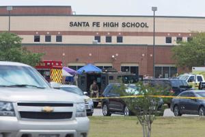 Emergency crews gather in the parking lot of Santa Fe High School where at least eight students were killed on May 18, 2018.(AFP File Photo) Emergency crews gather in the parking lot of Santa Fe High School where at least eight students were killed on May 18, 2018.(AFP File Photo)