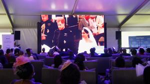 Guests watch a TV broadcast of Britain's Prince Harry and Meghan Markle's royal wedding at the Windsor golf and country club in Nairobi, Kenya May 19, 2018.(REUTERS) Guests watch a TV broadcast of Britain's Prince Harry and Meghan Markle's royal wedding at the Windsor golf and country club in Nairobi, Kenya May 19, 2018.(REUTERS)