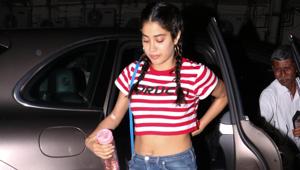 Janhvi Kapoor looks every bit a star here in a pair of torn jeans and red-and-white crop top.(Viral Bhayani) Janhvi Kapoor looks every bit a star here in a pair of torn jeans and red-and-white crop top.(Viral Bhayani)