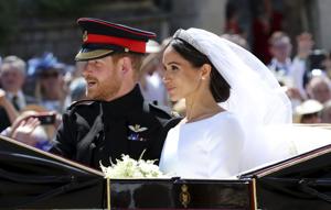Britain's Prince Harry and Meghan Markle leave after their wedding ceremony at St. George's Chapel in Windsor Castle in Windsor, England on May 19, 2018.(AP) Britain's Prince Harry and Meghan Markle leave after their wedding ceremony at St. George's Chapel in Windsor Castle in Windsor, England on May 19, 2018.(AP)