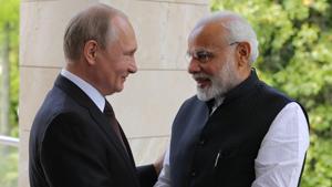 Russian President Vladimir Putin greets Prime Minister Narendra Modi during their meeting in the Bocharov Ruchei residence in the Black Sea resort of Sochi in Russia on May 21.(AP Photo) Russian President Vladimir Putin greets Prime Minister Narendra Modi during their meeting in the Bocharov Ruchei residence in the Black Sea resort of Sochi in Russia on May 21.(AP Photo)