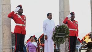 Sri Lankan President Maithripala Sirisena (2R) lays flowers at a memorial for those who died in the decades-long conflict against the Tamil Tigers, during a commemorative ceremony marking the 9th anniversary of the end of the islands Tamil separatist war, in the capital Colombo on May 19, 2018.(AFP) Sri Lankan President Maithripala Sirisena (2R) lays flowers at a memorial for those who died in the decades-long conflict against the Tamil Tigers, during a commemorative ceremony marking the 9th anniversary of the end of the islands Tamil separatist war, in the capital Colombo on May 19, 2018.(AFP)