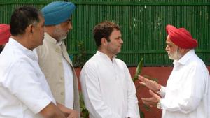 Amrik Singh Dhillon (R) talks to Congress president Rahul Gandhi as (from left) Rakesh Pandey and Randeep Singh Nabha look on, in New Delhi on Tuesday.(HT Photo) Amrik Singh Dhillon (R) talks to Congress president Rahul Gandhi as (from left) Rakesh Pandey and Randeep Singh Nabha look on, in New Delhi on Tuesday.(HT Photo)