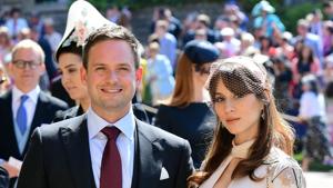 Meghan Markle's friend, US actor Patrick J. Adams and wife Troian Bellisario arrive for the wedding ceremony of Britain's Prince Harry, Duke of Sussex and US actress Meghan Markle at St George's Chapel, Windsor Castle.(AFP) Meghan Markle's friend, US actor Patrick J. Adams and wife Troian Bellisario arrive for the wedding ceremony of Britain's Prince Harry, Duke of Sussex and US actress Meghan Markle at St George's Chapel, Windsor Castle.(AFP)