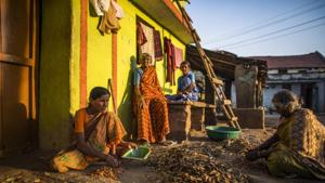 Women sort nuts outside their home in the village of Kuragunda in Karnataka. With almost 70 percent of India's 1.3 billion people living in rural villages and agriculture contributing about 16 percent of gross domestic product, what happens in the sector determines not only Prime Minister Narendra Modi's election fate, but also growth prospects for the $2.3 trillion economy.(Prashanth Vishwanathan/Bloomberg) Women sort nuts outside their home in the village of Kuragunda in Karnataka. With almost 70 percent of India's 1.3 billion people living in rural villages and agriculture contributing about 16 percent of gross domestic product, what happens in the sector determines not only Prime Minister Narendra Modi's election fate, but also growth prospects for the $2.3 trillion economy.(Prashanth Vishwanathan/Bloomberg)