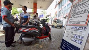 A fuel station displaying the current fuel prices in Guwahati on Monday. Petrol and diesel prices were increased in the range of 33-34 paise per litre and 25-27 paise per litre across Delhi, Kolkata, Mumbai and Chennai.(PTI Photo) A fuel station displaying the current fuel prices in Guwahati on Monday. Petrol and diesel prices were increased in the range of 33-34 paise per litre and 25-27 paise per litre across Delhi, Kolkata, Mumbai and Chennai.(PTI Photo)