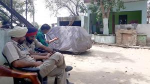 Police officials outside the dera at Jandu Singha village in Adampur, Jalandhar, on Monday.(Pardeep Pandit/HT) Police officials outside the dera at Jandu Singha village in Adampur, Jalandhar, on Monday.(Pardeep Pandit/HT)