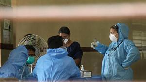 Hospital staff wears safety masks as a precautionary measure at the Kozhikode Medical College where patients infected with the Nipah virus are being treated.(PTI Photo) Hospital staff wears safety masks as a precautionary measure at the Kozhikode Medical College where patients infected with the Nipah virus are being treated.(PTI Photo)