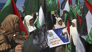 Hamas supporters wave their green Islamic and national flags during a rally against US President Donald Trump's decision to recognize Jerusalem as Israel's capital, at Palestine square in Gaza City, Wednesday, March 7, 2018.(AP) Hamas supporters wave their green Islamic and national flags during a rally against US President Donald Trump's decision to recognize Jerusalem as Israel's capital, at Palestine square in Gaza City, Wednesday, March 7, 2018.(AP)