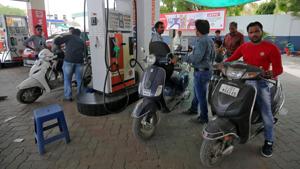 People get their two-wheelers filled with petrol at a fuel station in Ahmedabad, India.(REUTERS File Photo) People get their two-wheelers filled with petrol at a fuel station in Ahmedabad, India.(REUTERS File Photo)