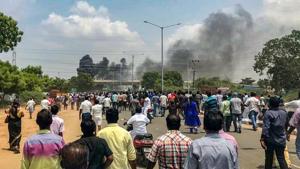 Smoke billows out of burning vehicles after a violent protest demanding closure of Vedanta's Sterlite Copper unit entered the 100th day, in Tuticorin, on Tuesday.(PTI file photo) Smoke billows out of burning vehicles after a violent protest demanding closure of Vedanta's Sterlite Copper unit entered the 100th day, in Tuticorin, on Tuesday.(PTI file photo)